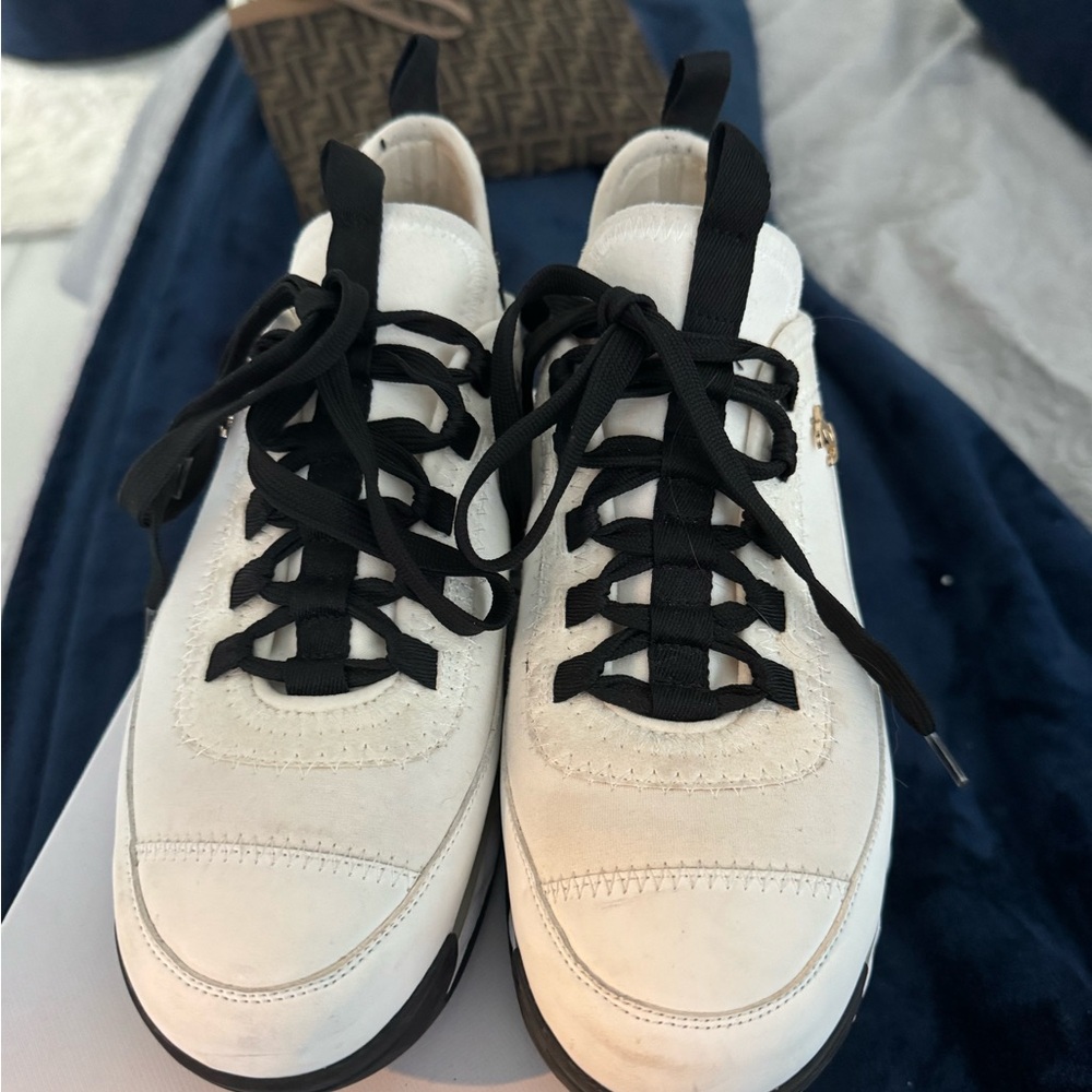 CHANEL White and Black Sneakers with Gold Accent - Picture 2 of 6